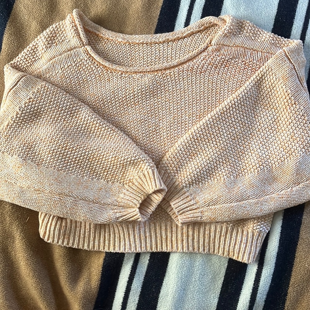 Cropped light orange sweater could be used as a shirt, medium weight